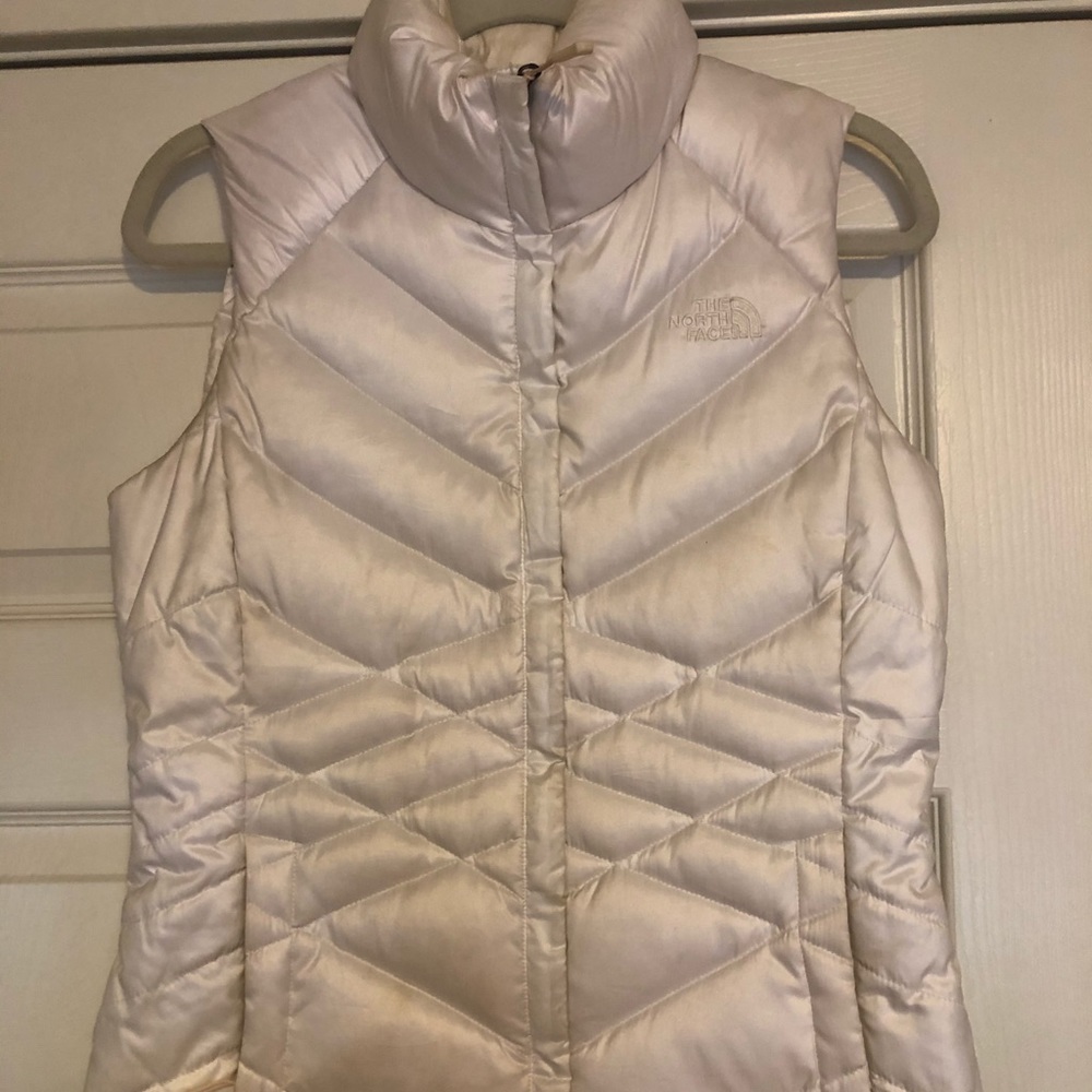 White North face puffer vest, size small women’s